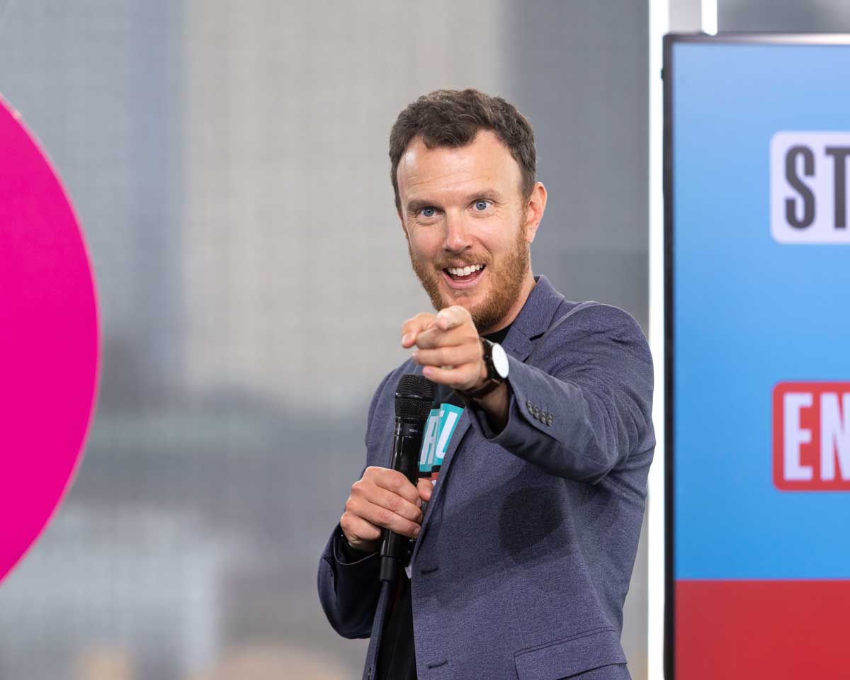 Dave Sinkinson on stage talking about entrepreneurship.