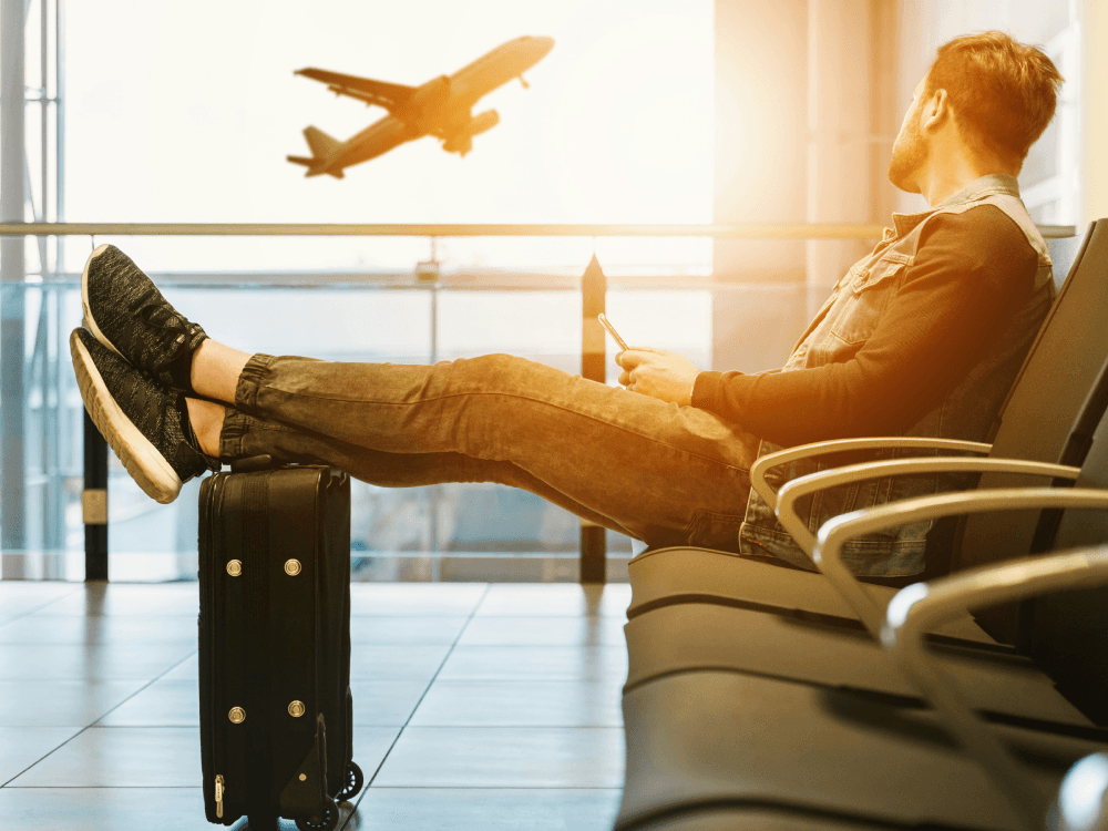 A newcomer to Canada, at the airport, wondering if they can use their homeland credit score in Canada.
