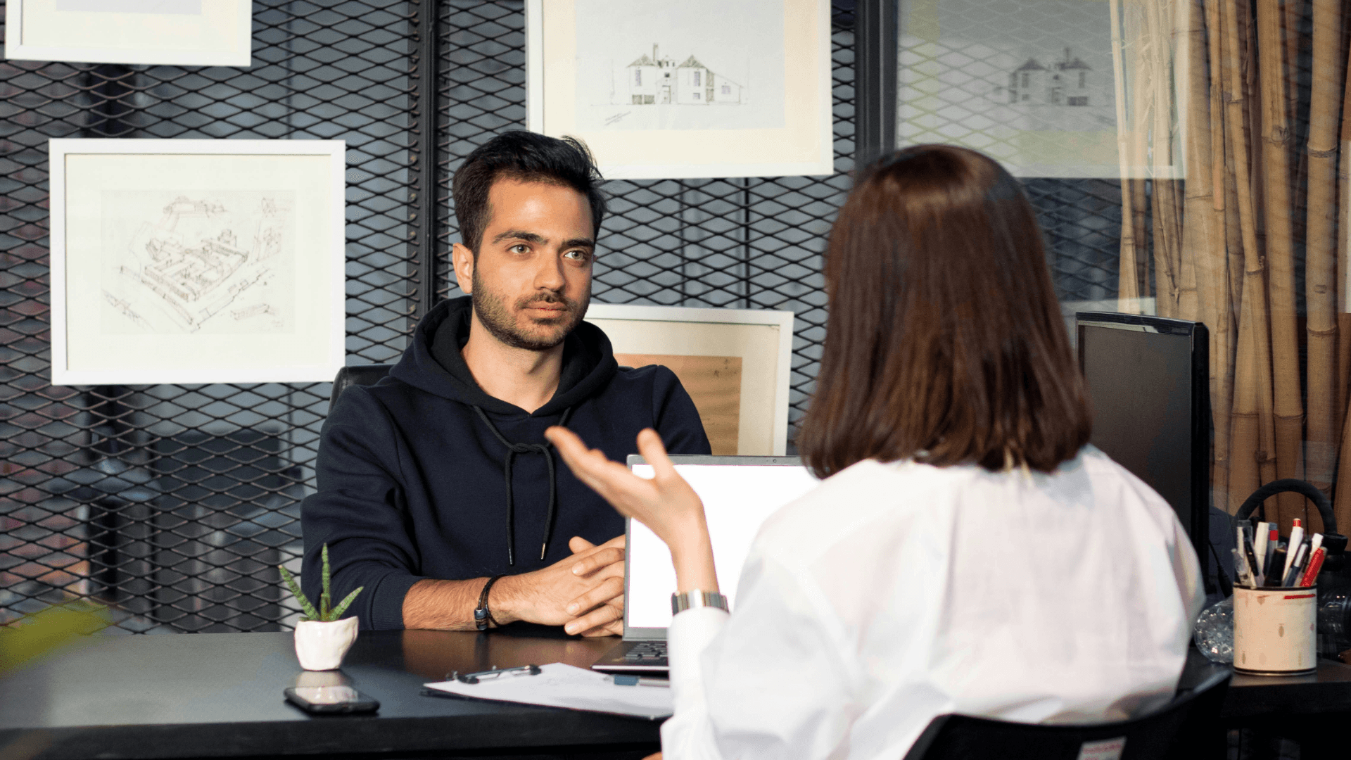A Canadian woman negotiating a pay increase with her potential boss.