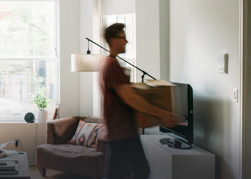 A Canadian young man, blurred, to symbolize that he's moving back in as fast as he moved out, making him a boomerang kid.
