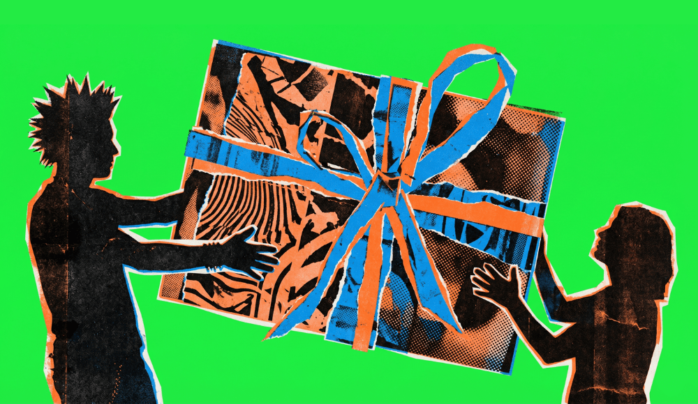 Someone giving a prepaid card wrapped as a gift