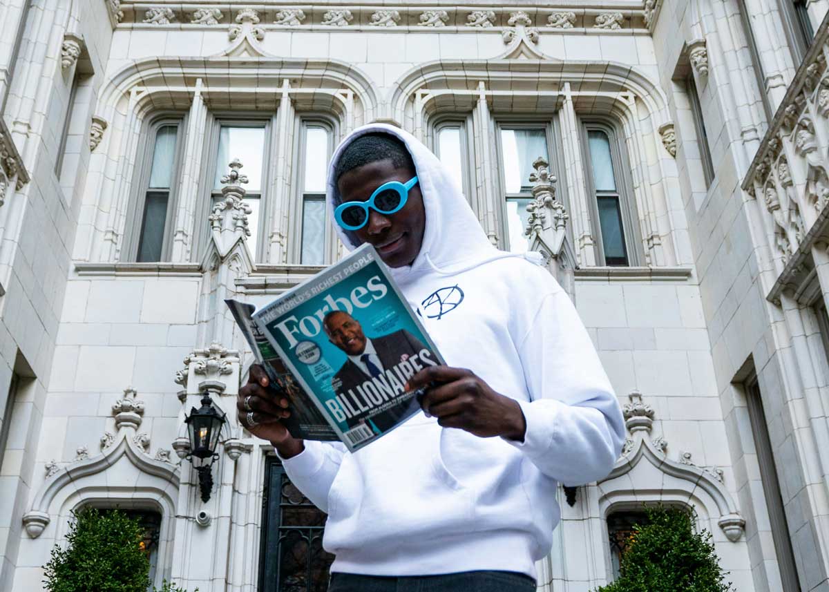 A Canadian man reading Forbes “rich list,” wondering about how more money can result in better money management and less problems.