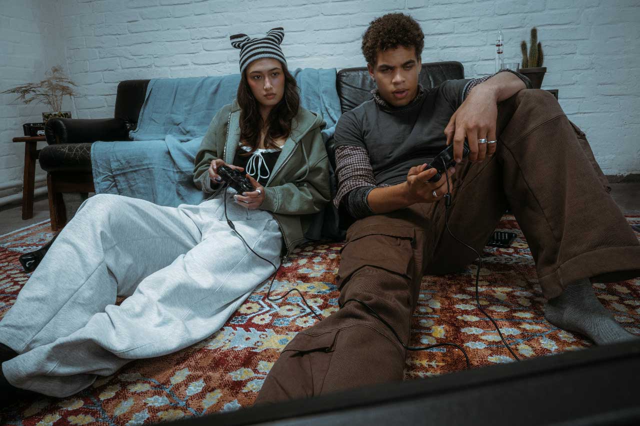 Two Canadians with retro clothes and playing video games, who participate in the risky business of hype buying and reselling.