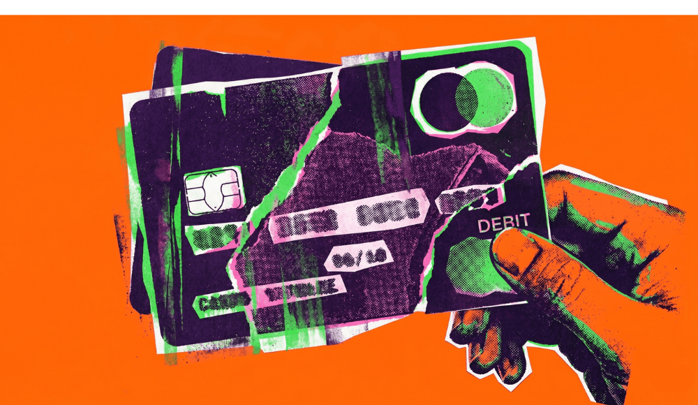 A MasterCard debit card in the hand of a customer