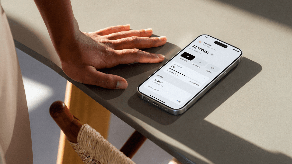 A person accessing their Neo Financial Savings Account on their smartphone