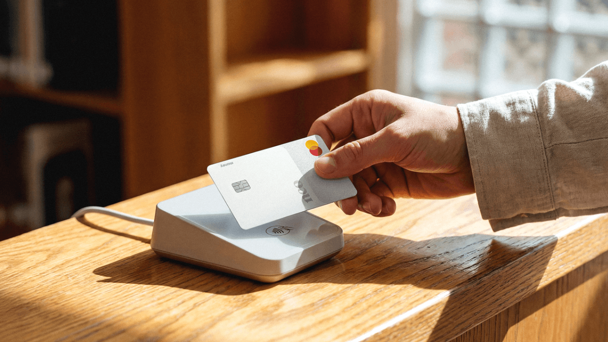 A customer pays using the Neo Financial Mastercard Debit