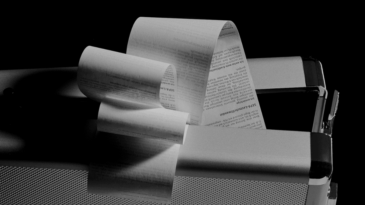 A continuously printing receipt, signifying automatic payments from a bank account