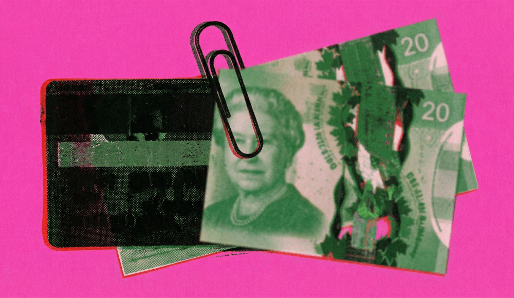 Canadian 20 dollar bills clipped to a credit card to increase its limit