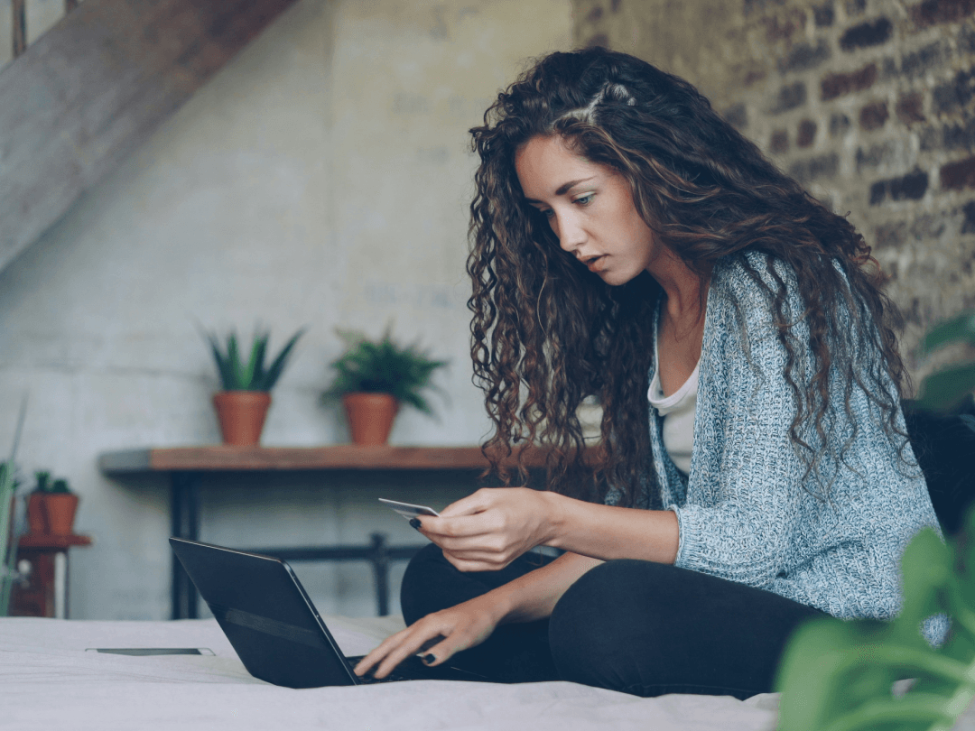 A Canadian woman trying to apply for credit online and not understanding why her credit score has unchanged and why she's being charged more in interest.