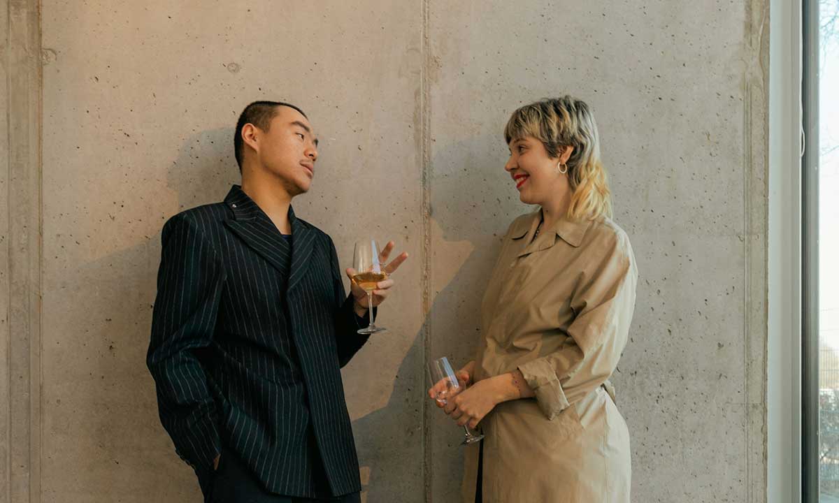 A Canadian woman and Canadian man casually debating what getting an income tax refund mean.