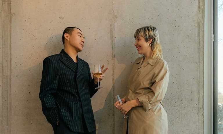 A Canadian woman and Canadian man casually debating what getting an income tax refund mean.